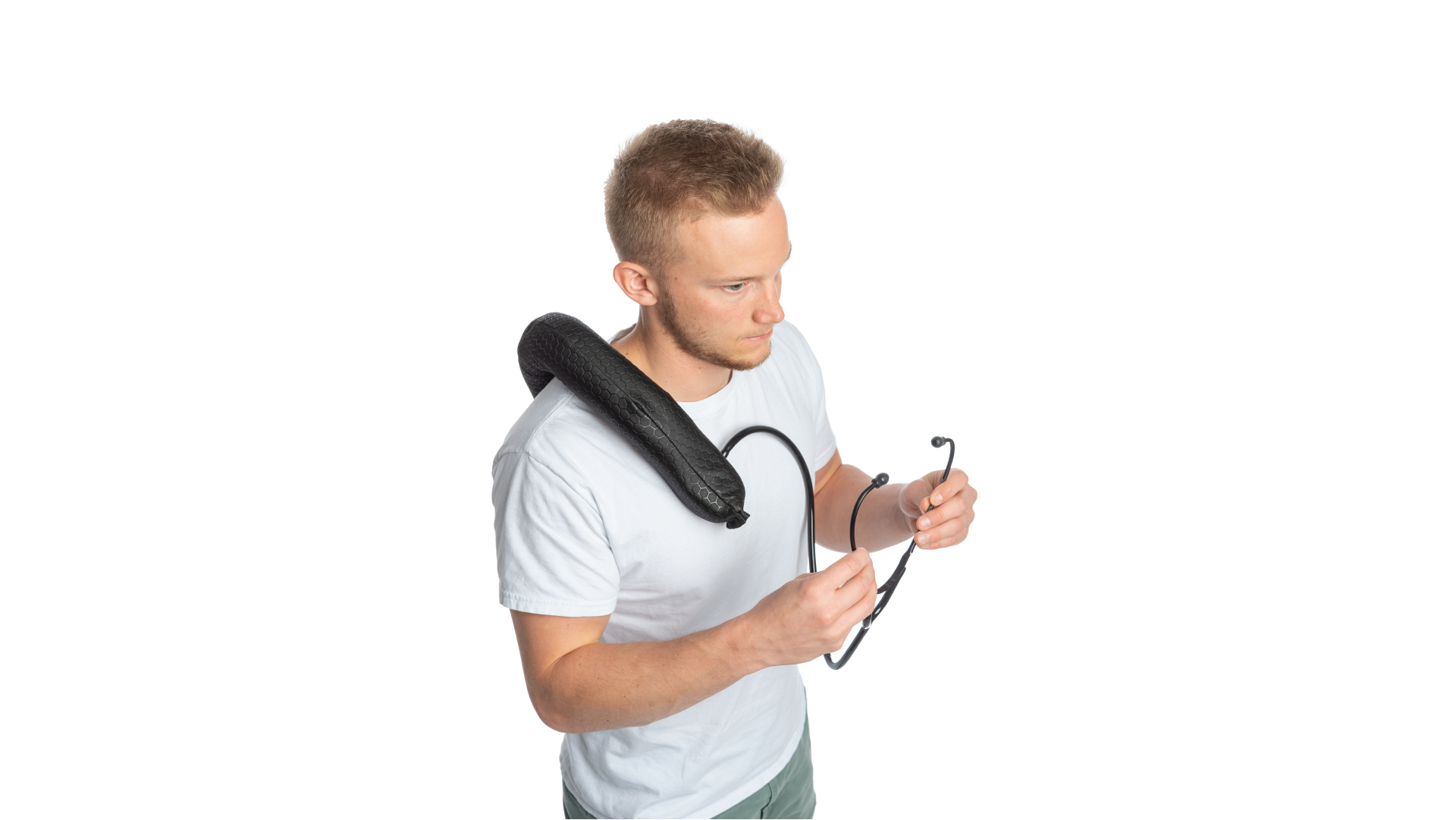 Person holding a stethoscope in their hands with a black wearable bag on the shoulders.