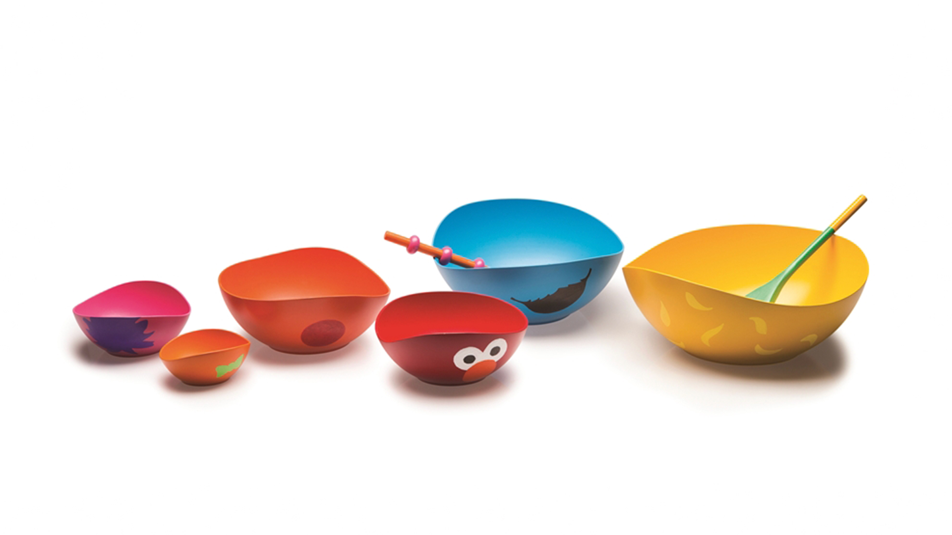 6 colorful bowls of assorted size and 2 long spoons