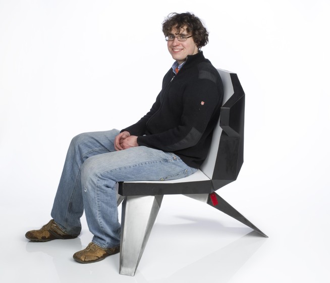 Student sitting at the chair.