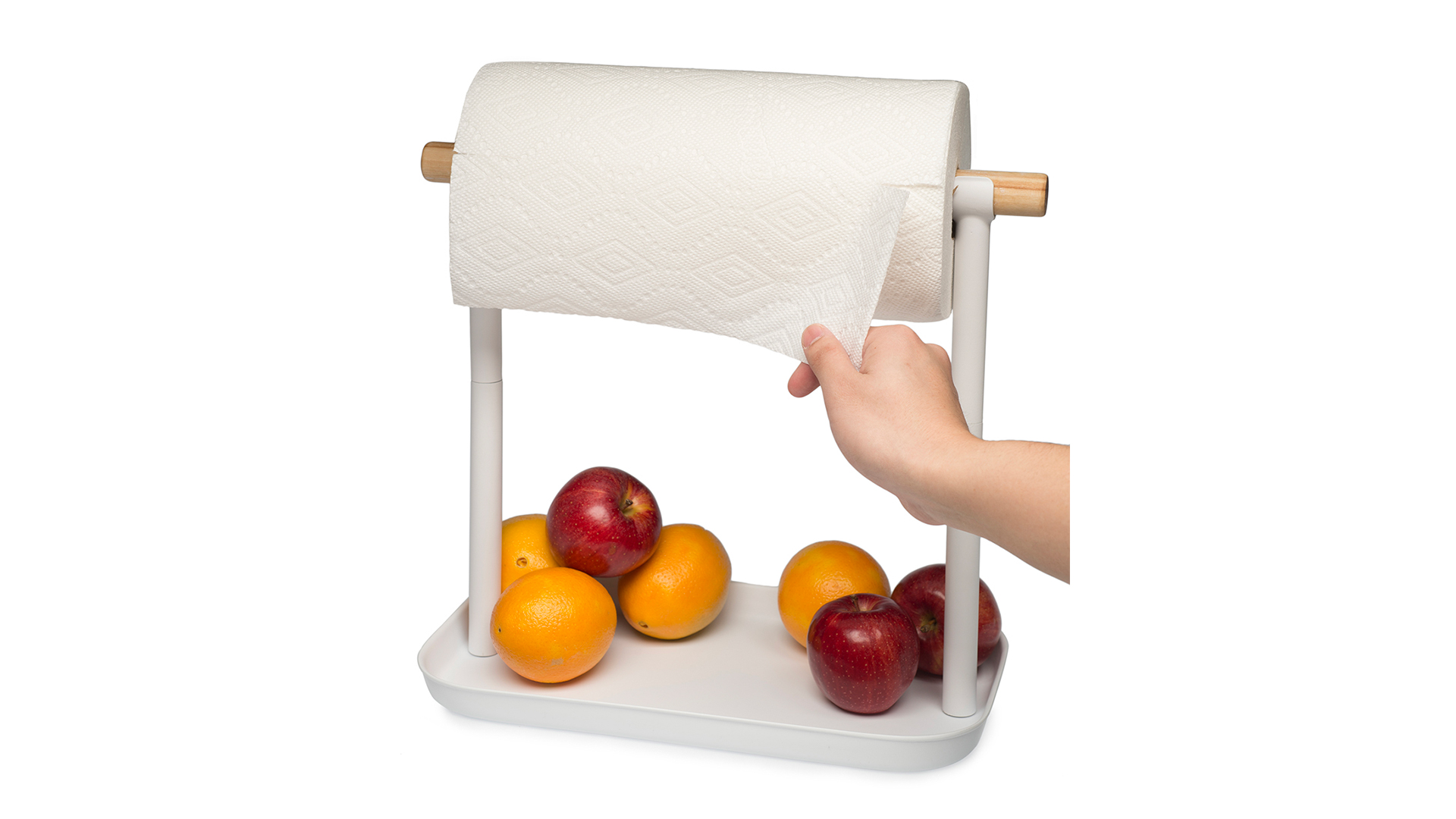 Someone pulling on paper towel roll on top pole with assorted fruit sitting in bottom tray