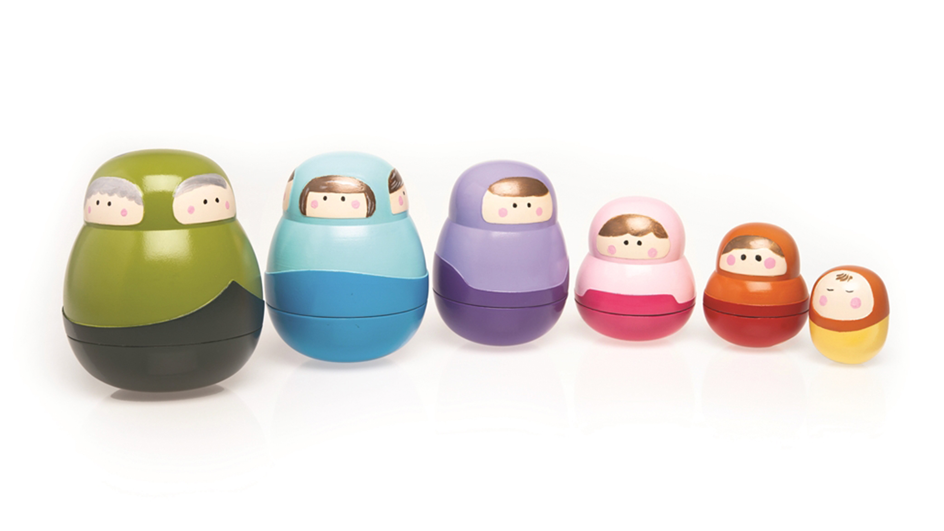 Six nesting dolls of different colors side by side with faces characterizing different life stages and ages