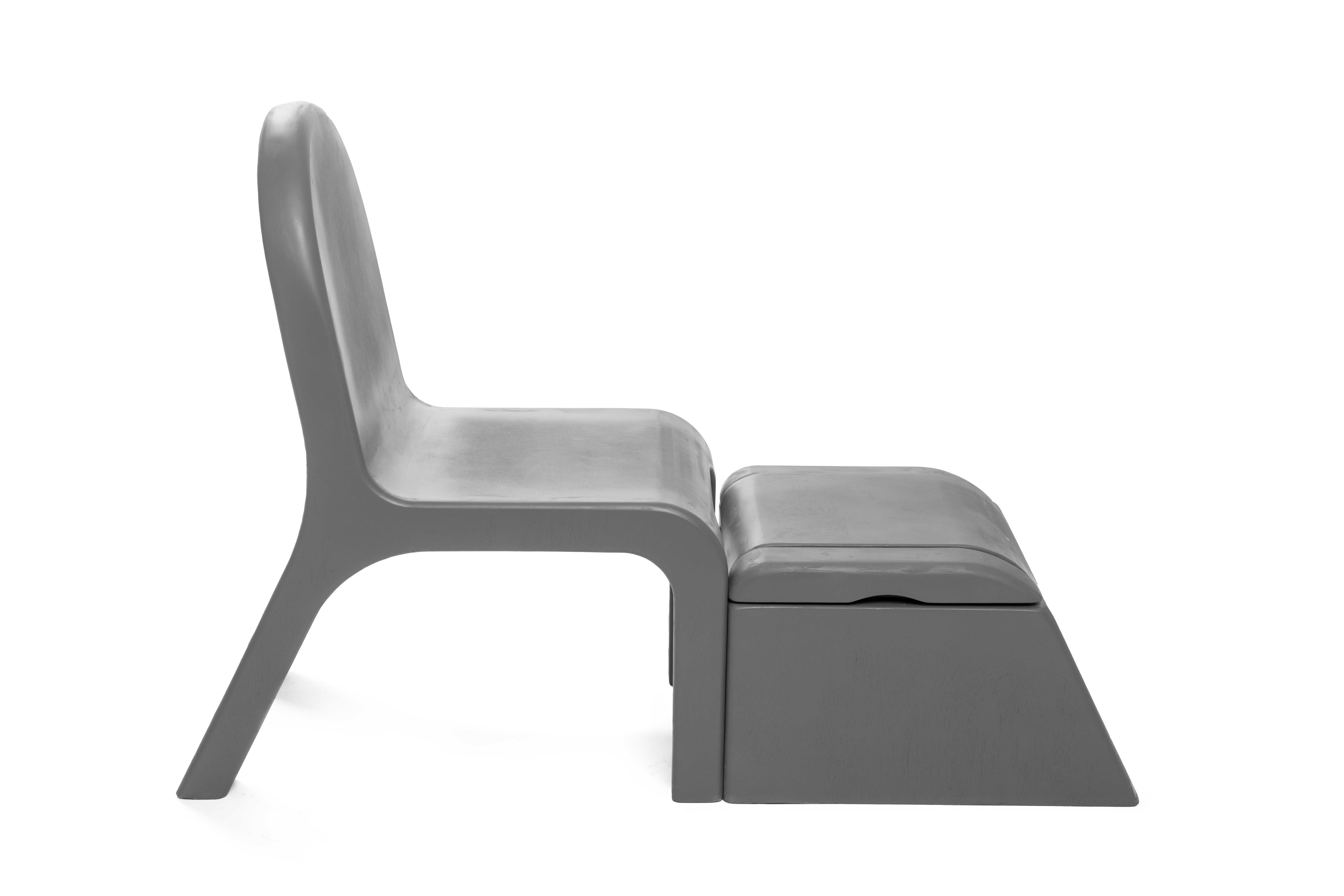 Side view photo of Care Chair model with the storage compartment out in front. 