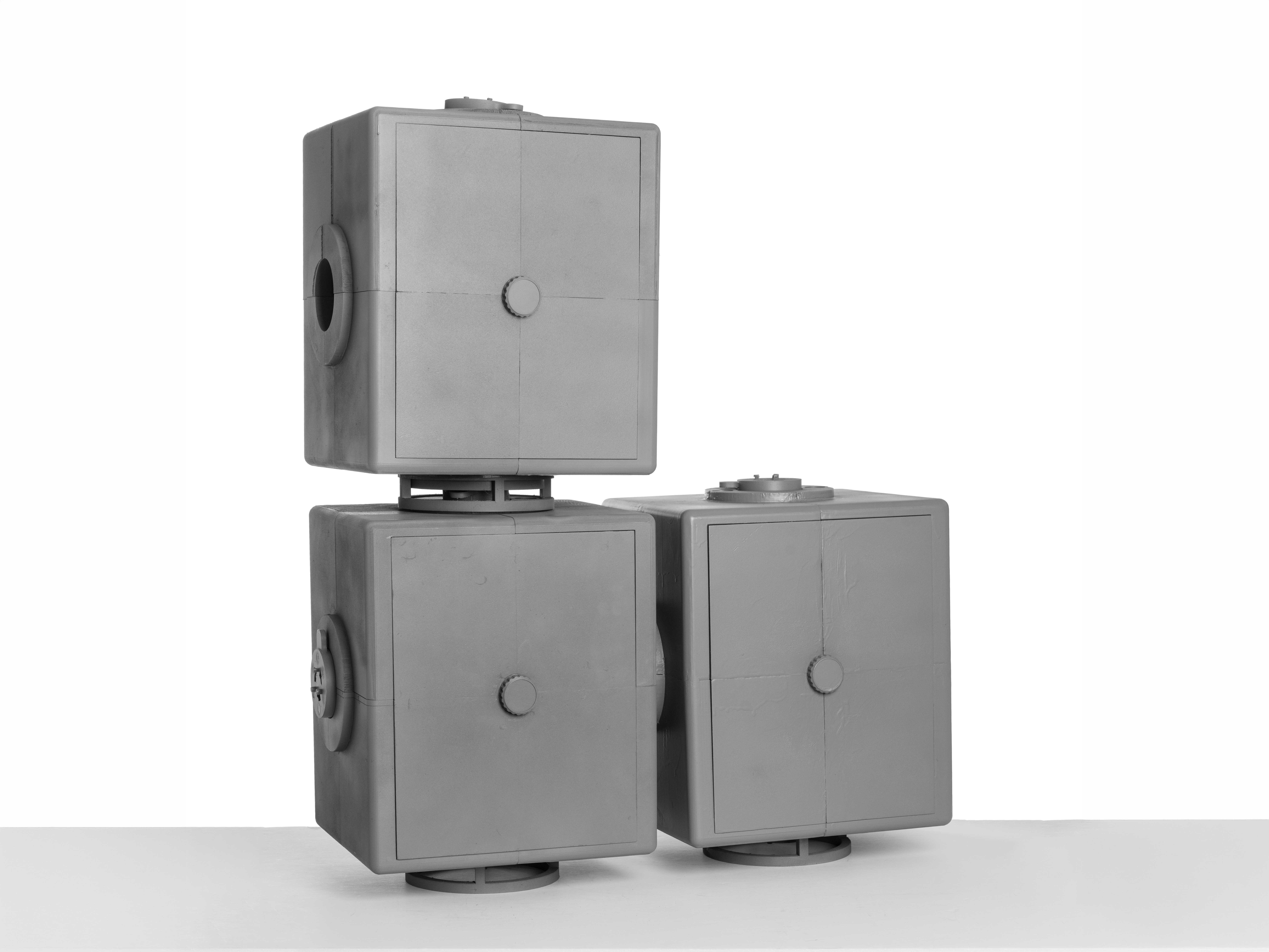 Photo of 3 interlocking vessels of the Eterna Safe, of which are stacked. 