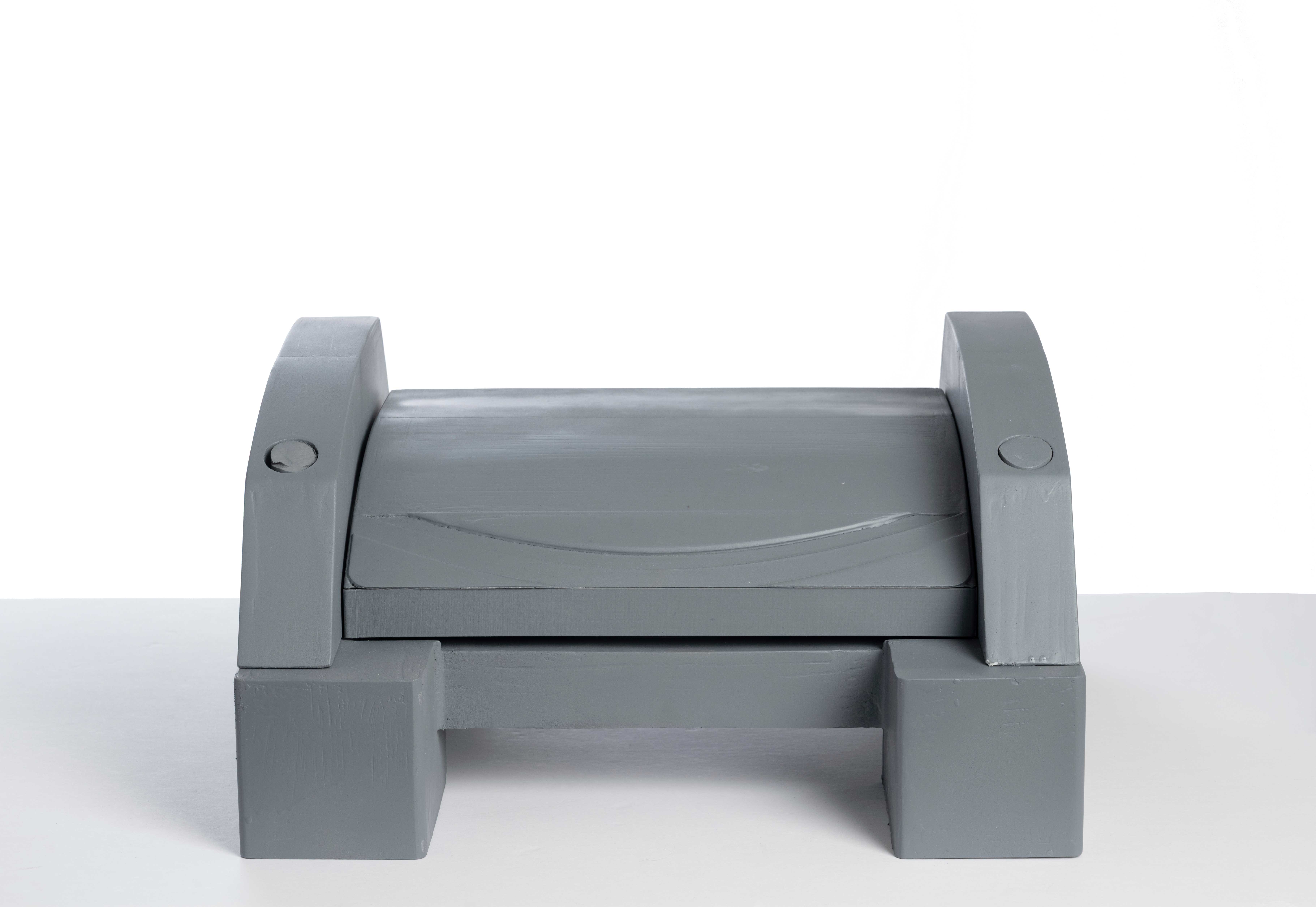 Photo of Kee Vault grey model sitting on a surface. 