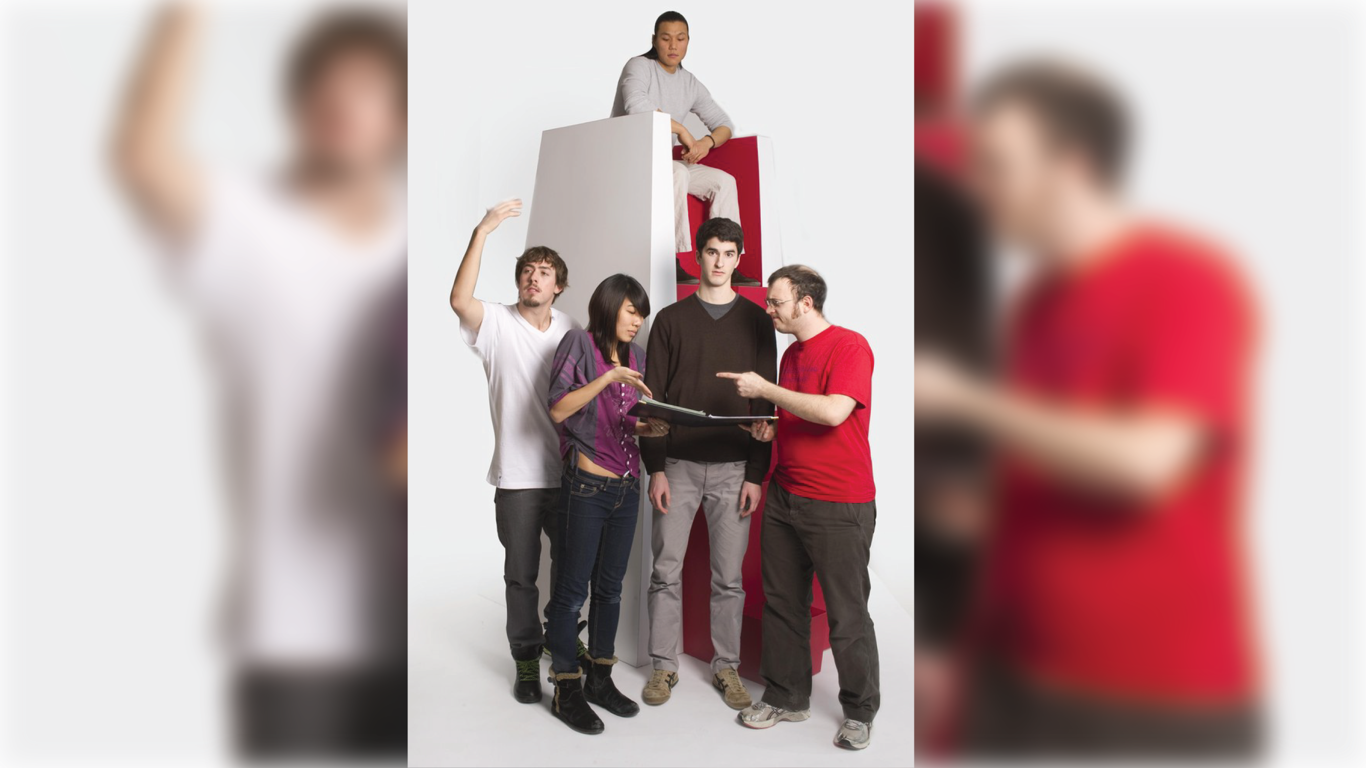 Students interacting with the elevated chair.