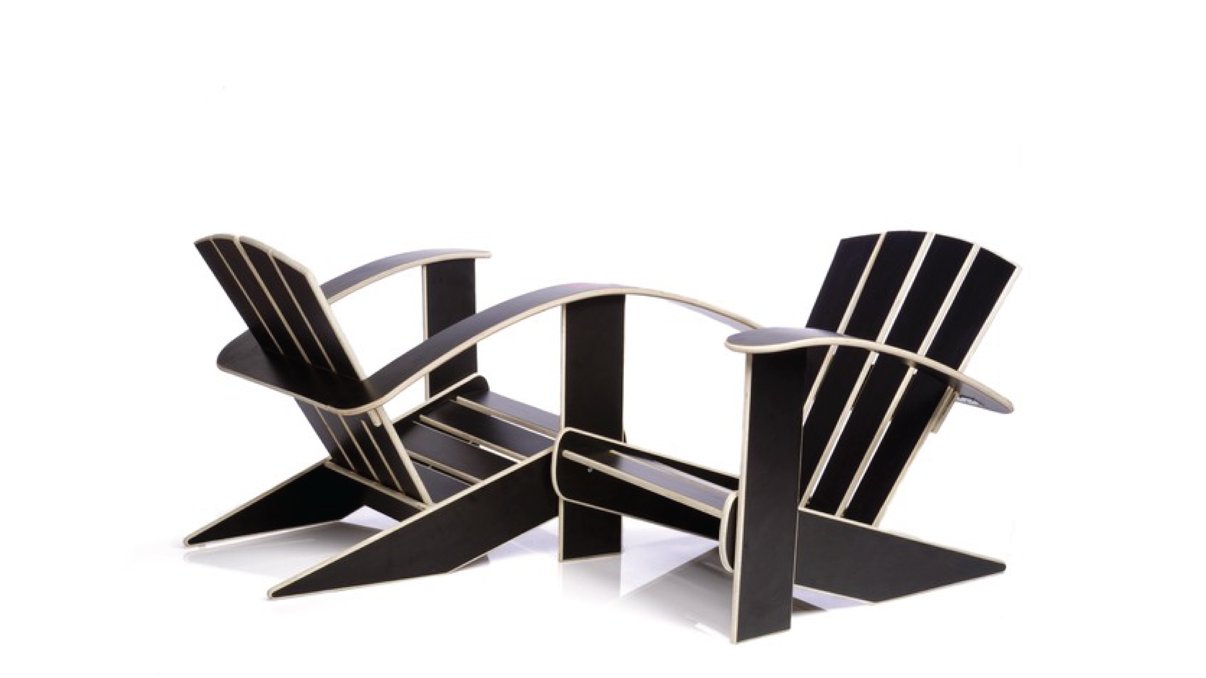 Two Adirondack-style chairs oriented towards each other that share a common armrest.
