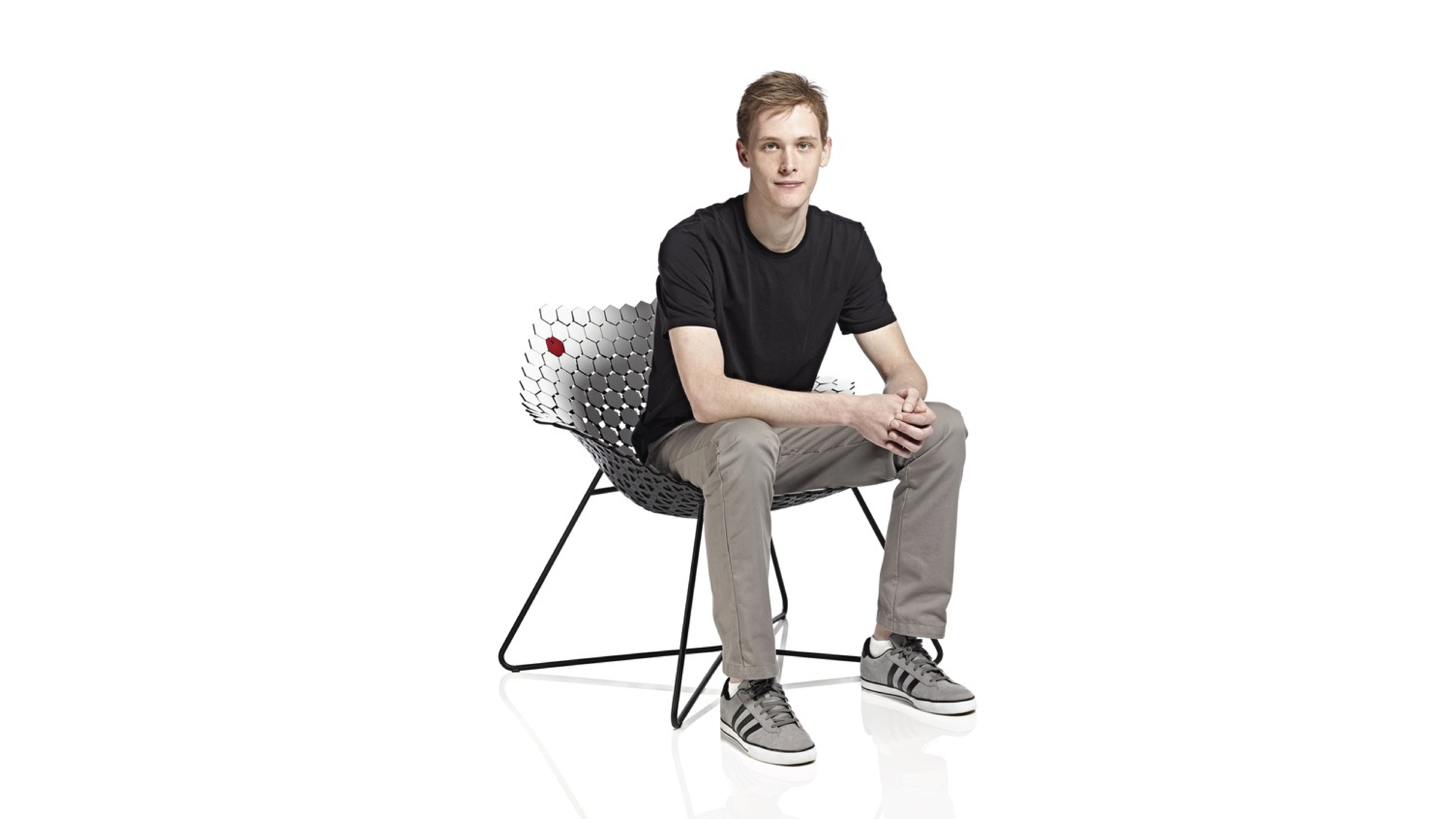 Student sitting at a lounge-type seat