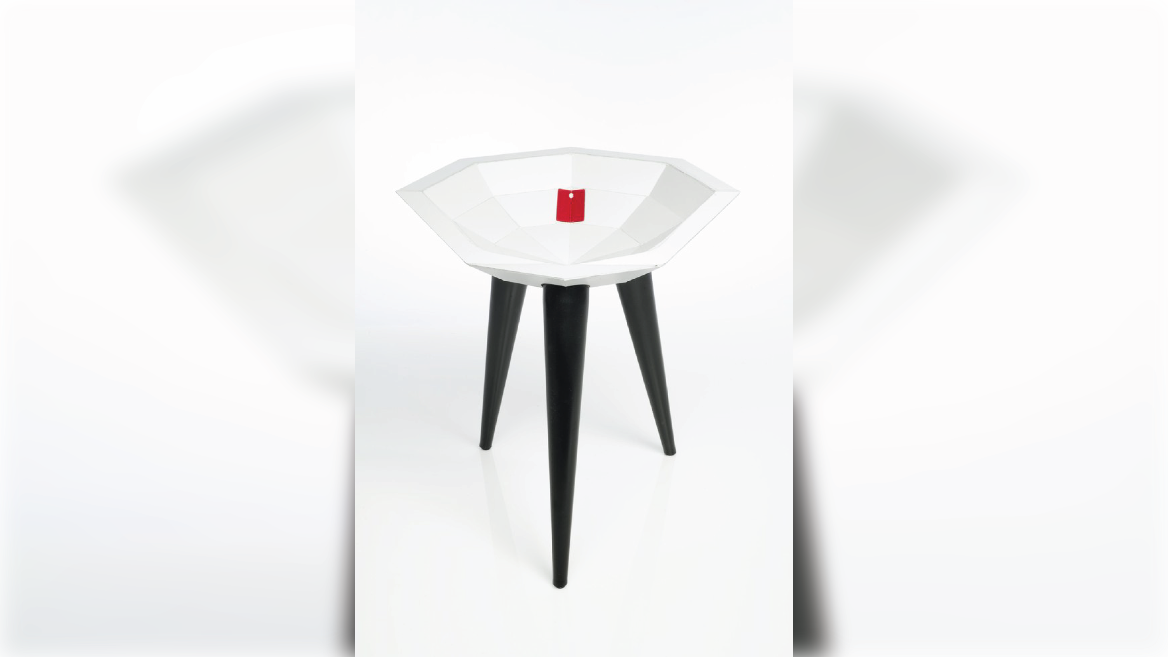 3-foot stool with a bowl-shape seat.