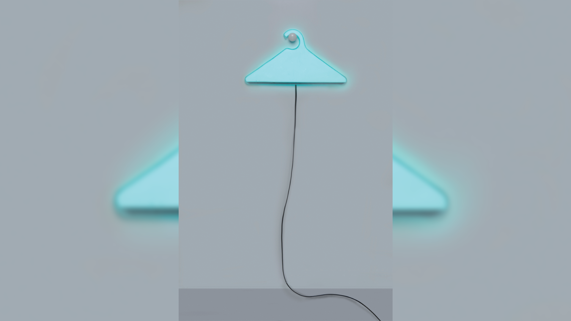 Clothes hanger with integrated light source.