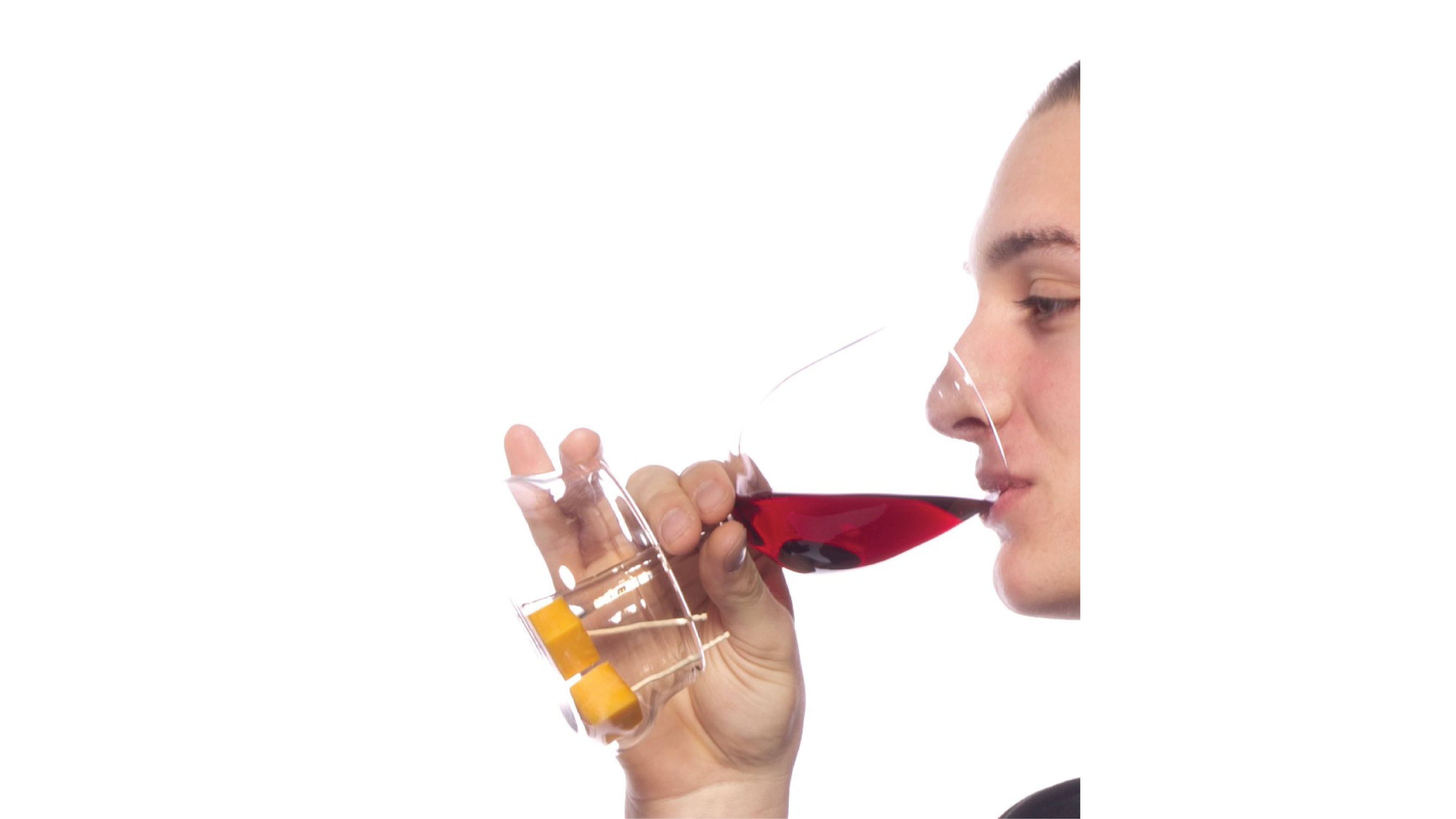 Person drinking wine from the glass.