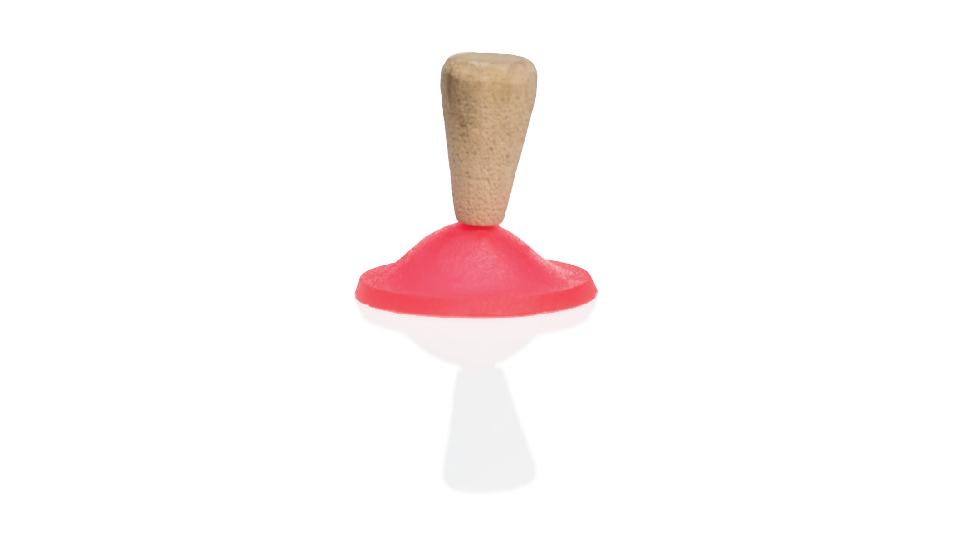 Mushroom toy is upside down with its cap inverted and placed on the floor.