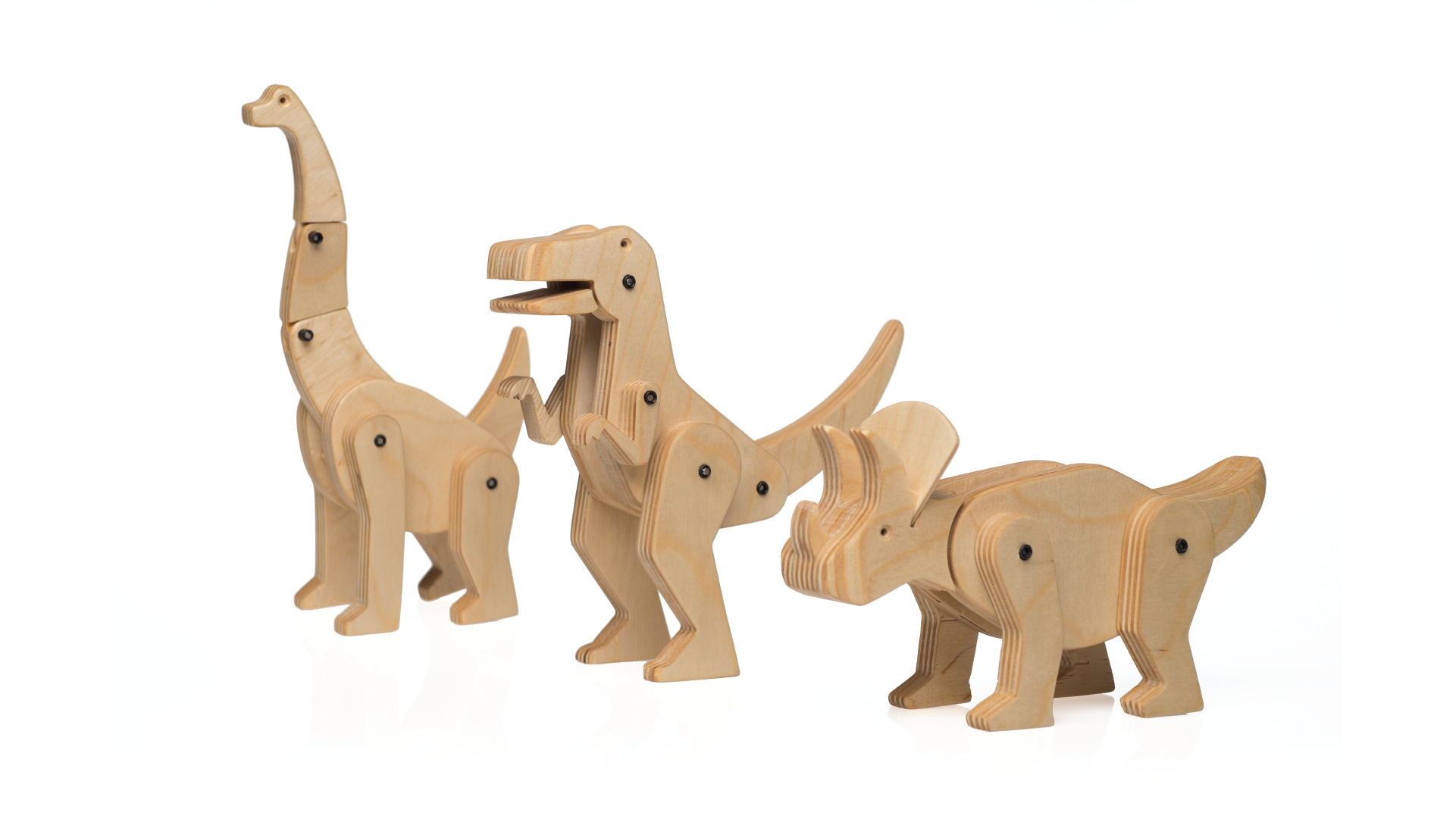 3 wooden toys representing 3 different types of dinosaurs.