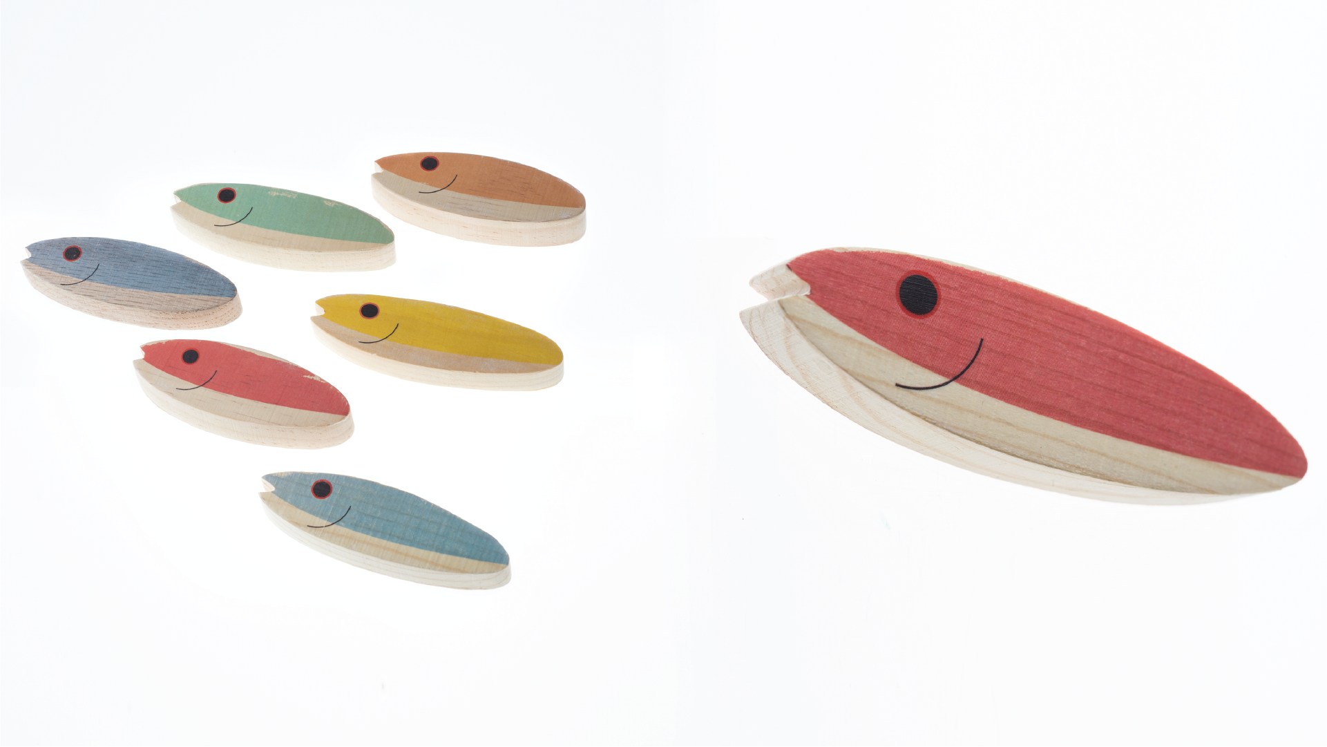 7 wooden toys in a shape of a fish in 4 different colors - red, blue, green and yellow.