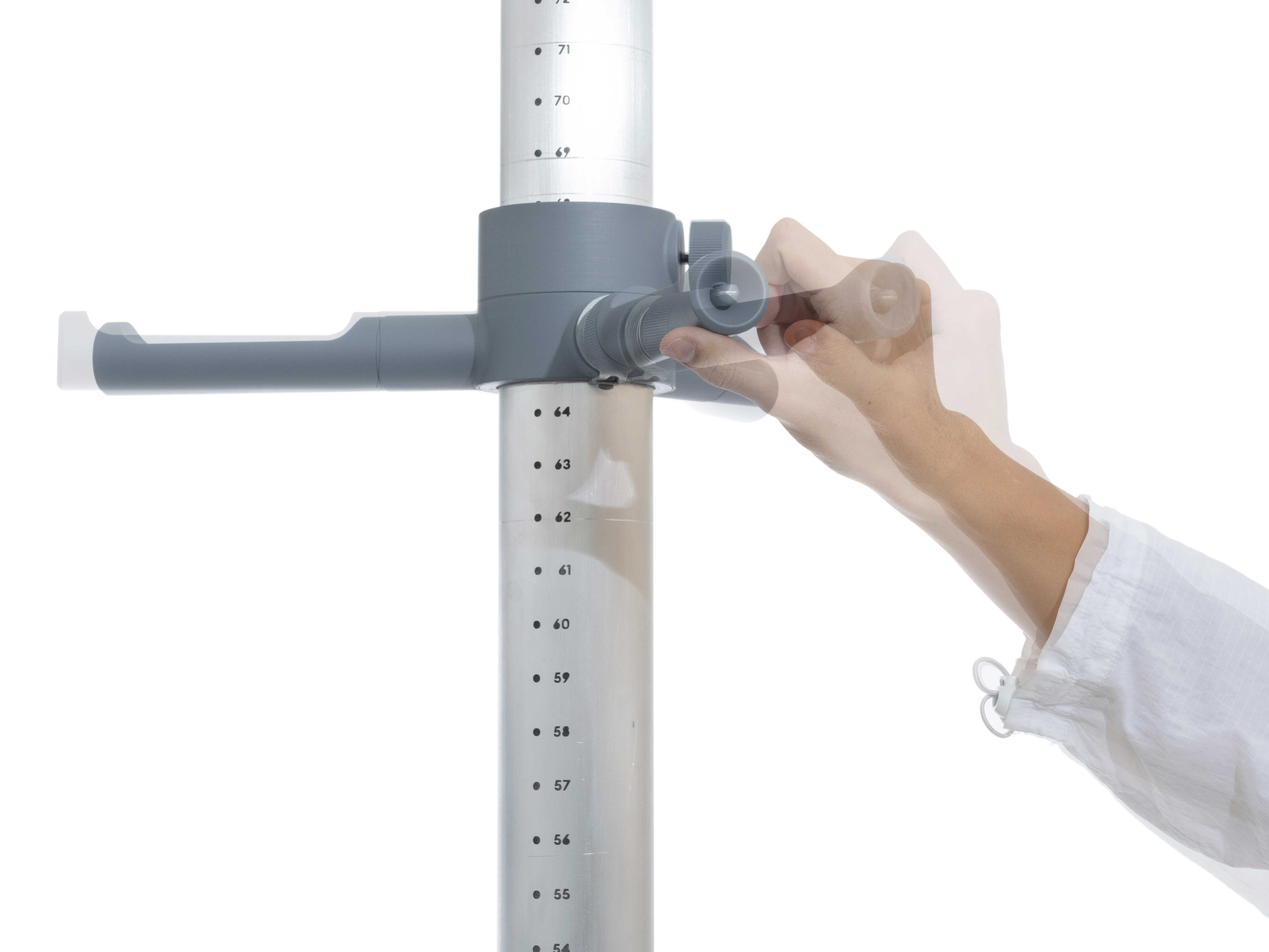 A close up photo of Strata model being adjusted by a hand. 