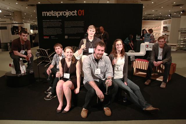 A group of students pose for a photo at the International Contemporary Furniture Fair.