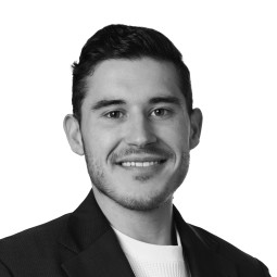 Black and white headshot photo of Chris Dimovski. 
