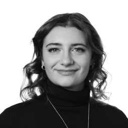 Black and white headshot photo Emma Kobelia.