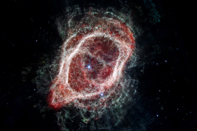 The Southern Ring Nebula, or NGC 3132, is shown through the lens of the James Webb Space Telescope.