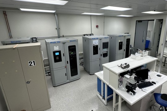 overhead view of lab with several tube furnaces.