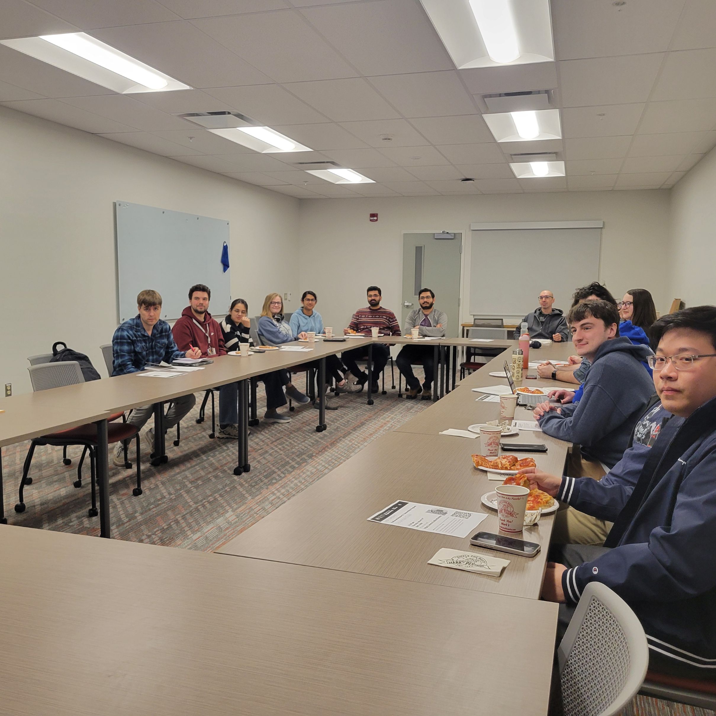 March 2025 Journal Club: trainees listening to presenter, Mahan Sahafipourfard (not pcitured)