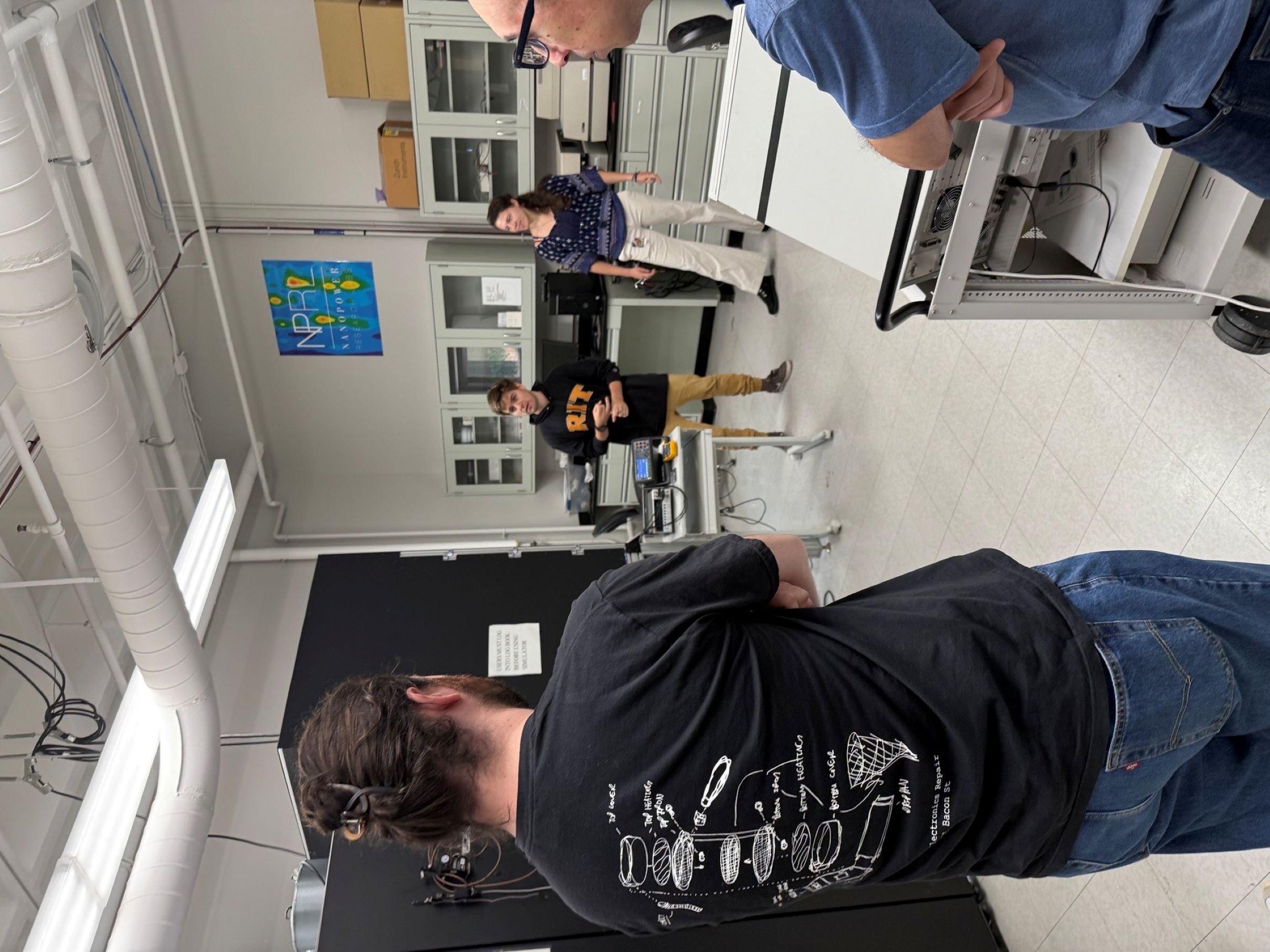 Trainee showing his lab work