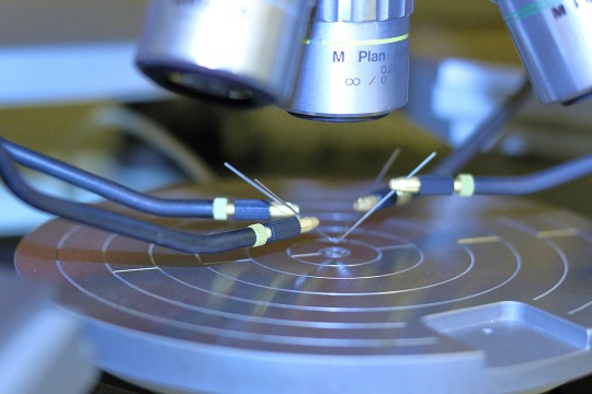 a close up of a machine with some wires on it.
