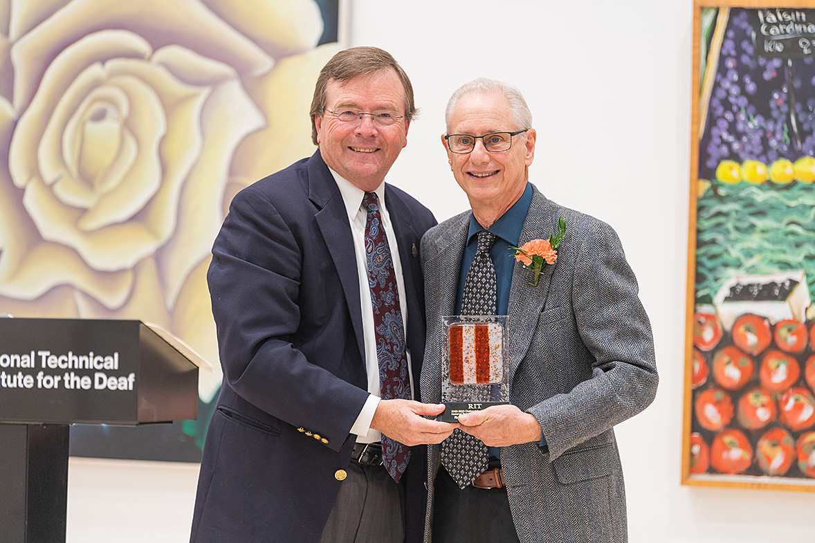 Dr. Gerard Buckley poses with Robert Sidansky at the Distinguished Alumni Award Reception.