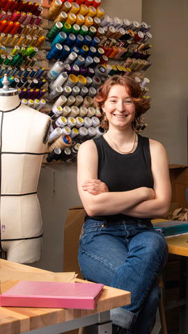 Ohl in lab with fabrics and thread