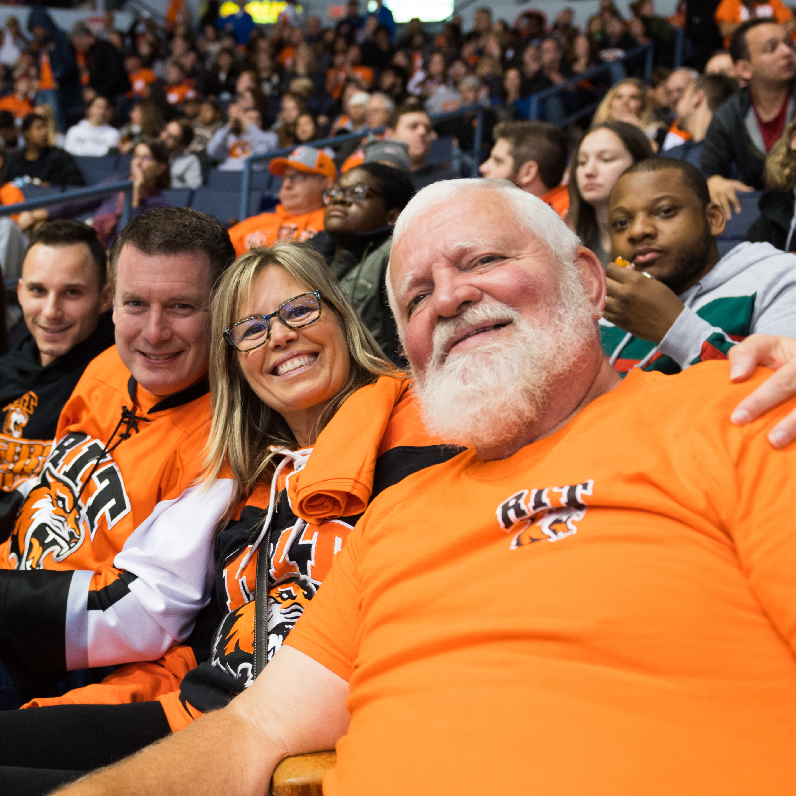 Fans enjoying the RIT Hockey game during Brick City