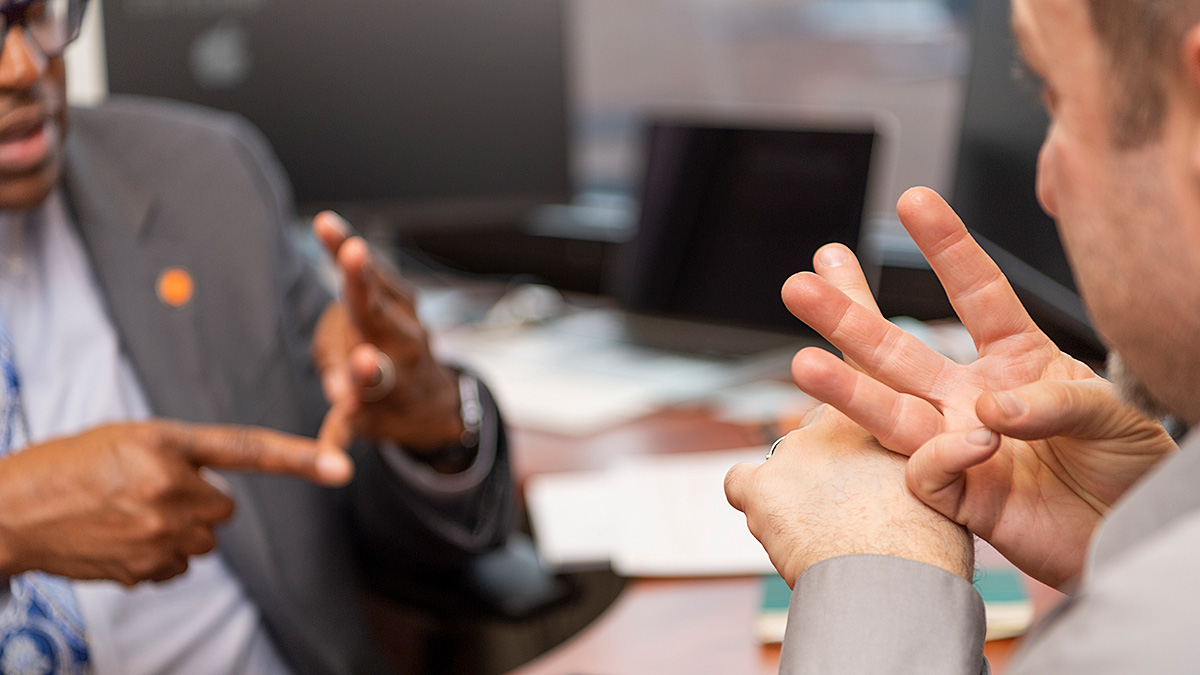 Close-up photo of hands signing