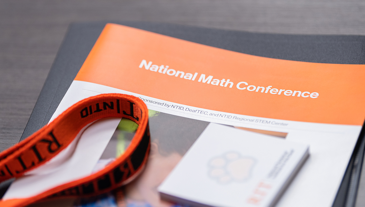 Math Competition Brochure and lanyard