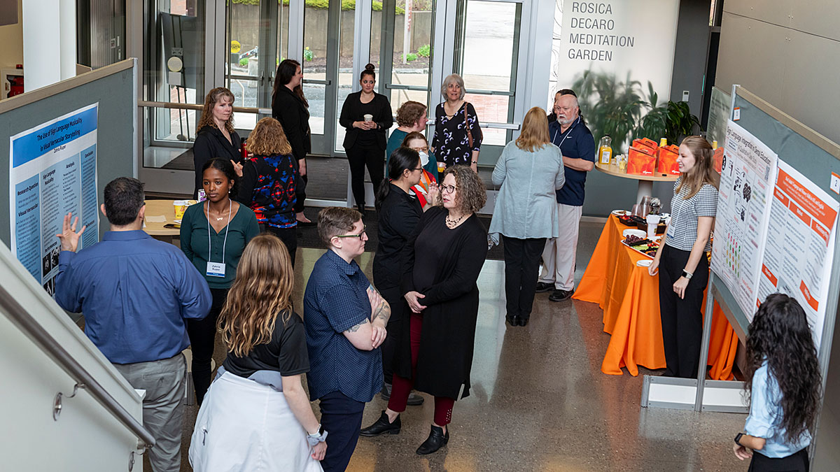 Students and visitors in Rosica Hall for the Student Research Fair