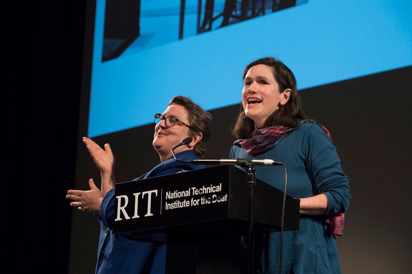 Remarks being given by Lucinda D. Robb, Granddaughter of President Lyndon B. and Lady Bird Johnson; interpreter is standing next to Lucinda