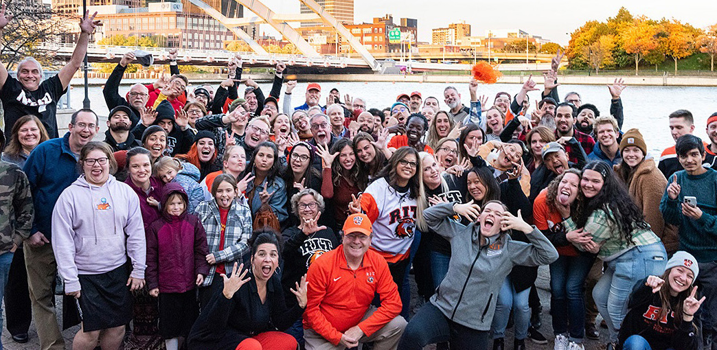 large group of alumni posing for photo