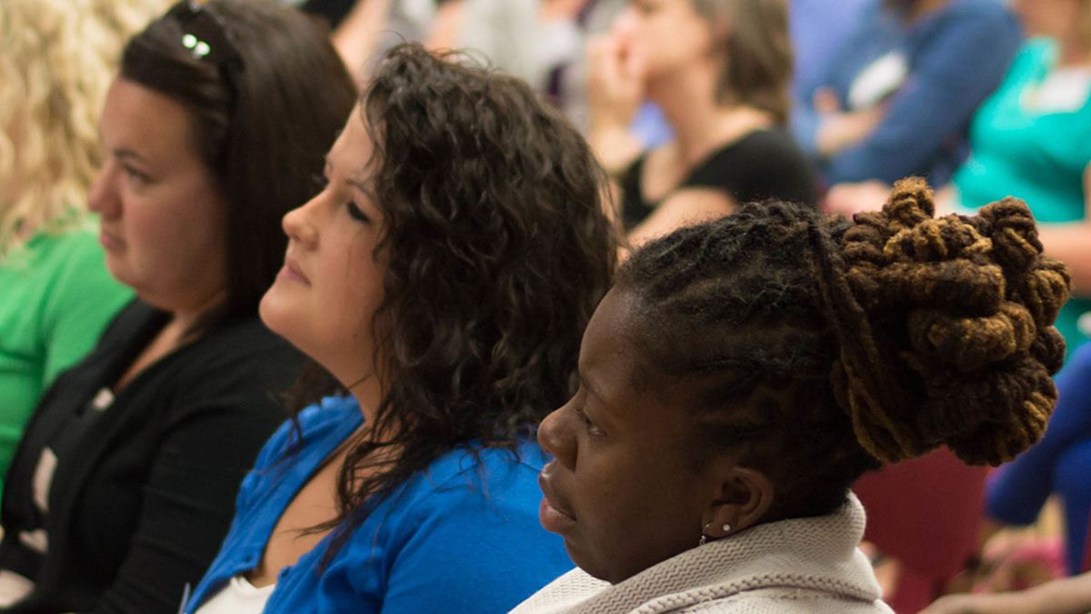 Audience members at conference