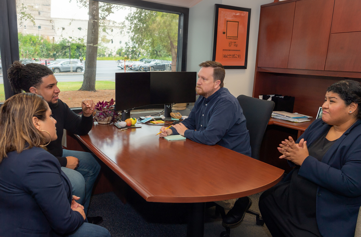 People in conversation, with interpreter(s)