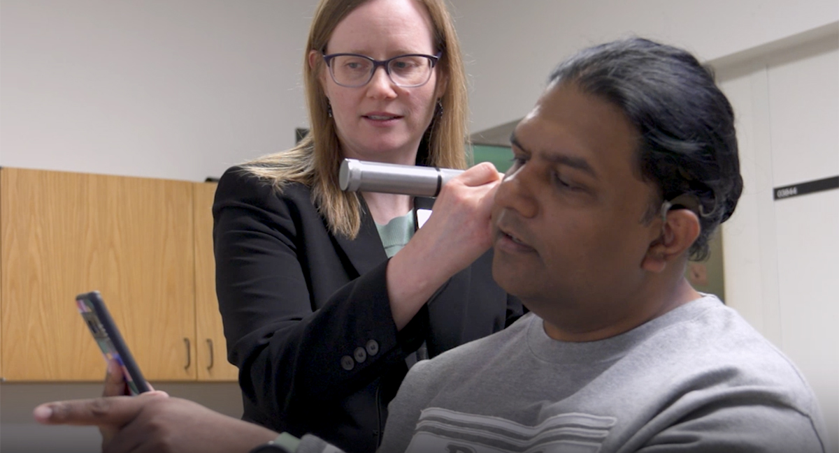 Audiologist working with CI patient