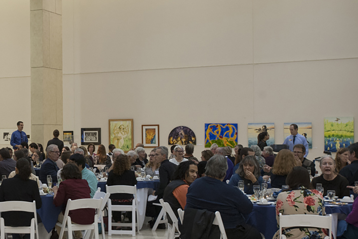 People seated at tables at RADSCC Deaf Mute Banquet
