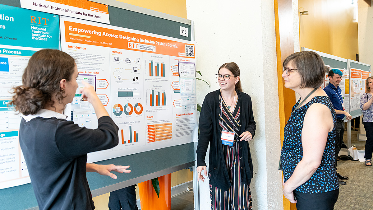 Student presenting at the research symposium