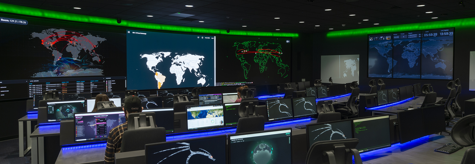 Photo of cybersecurity room with monitoring equipment and displays