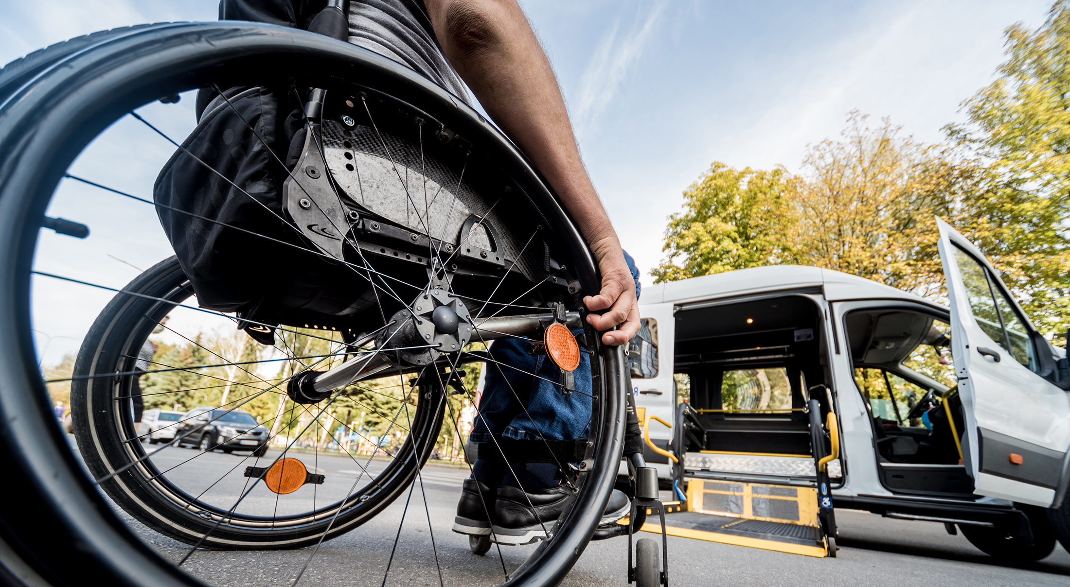 Student in wheelchair getting ready to enter transport van