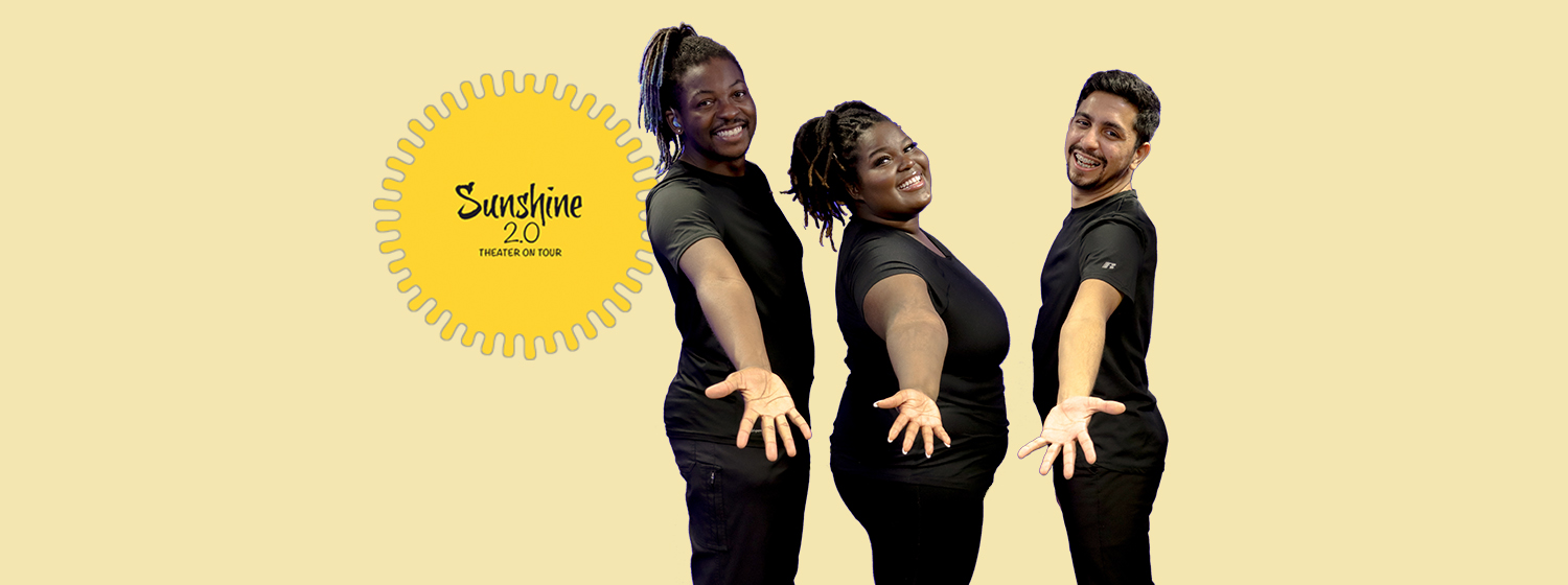 Sunshine 2.0 troupe posed together with dark shirts and arms stretched
