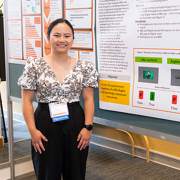 Emma presenting at the research symposium