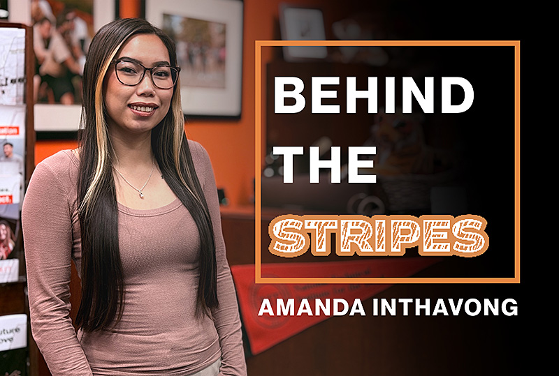 Amanda Inthavong faces the camera. To the right of the image is a graphic that reads 'Behind the Stripes.'