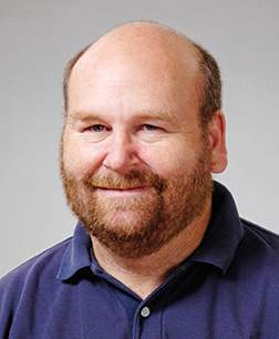 Portrait of Sam Holcomb