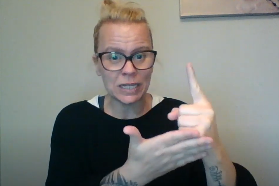 Woman signing to camera about SAISD facts week topic of vaping.