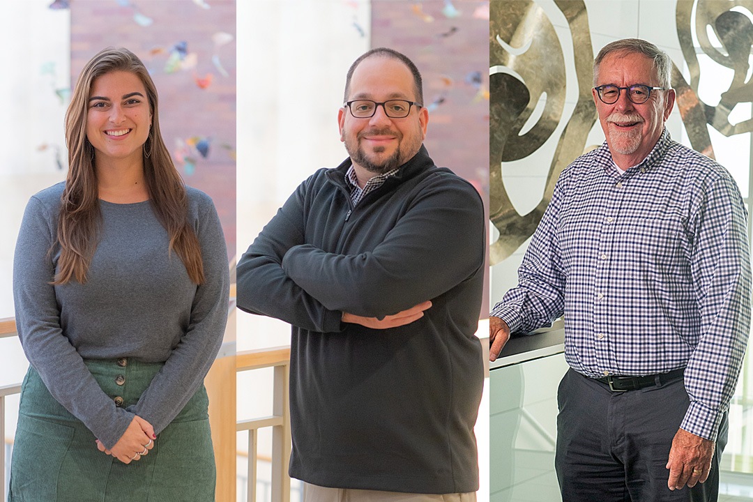 A three-panel composite image featuring individual portraits of three smiling professionals standing indoors. From left to right: a woman with long brown hair in a grey long-sleeve shirt and green skirt, a man with glasses and a beard wearing a black quarter-zip pullover with his arms crossed, and an older man with glasses and a gray beard wearing a blue and white checkered button-down shirt.