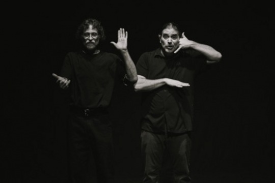 People signing on stage