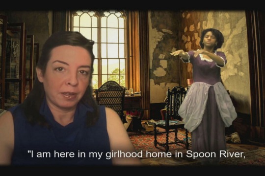 screenshot of virtual performance where woman in period clothing is signing and another woman is talking.