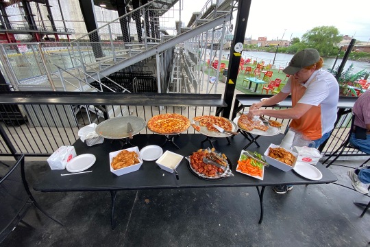 Chicken wings, pizza, and other refreshments were provided during the gathering. Photo credit: Sara Smania